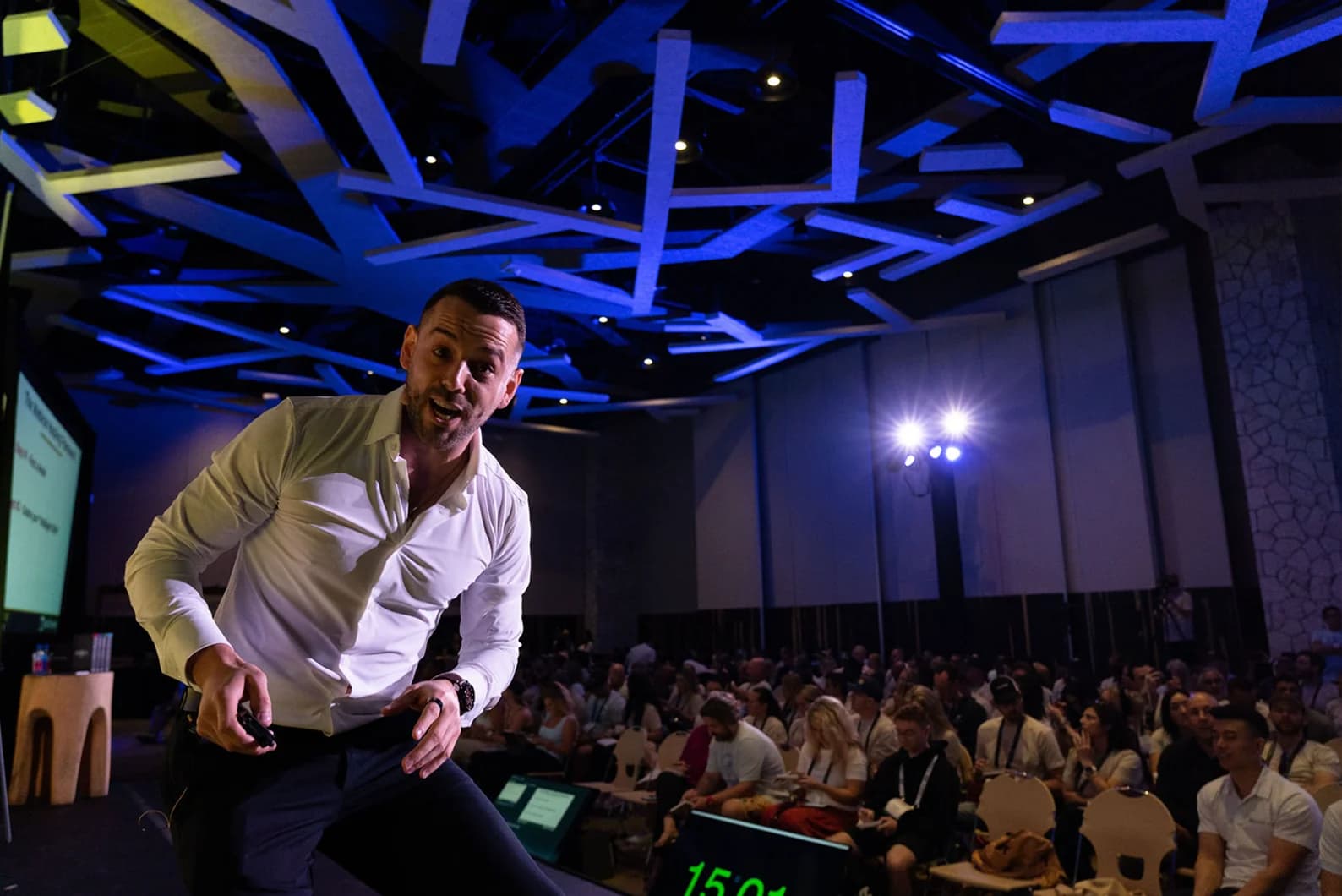 Dany D. Therrien on stage at a conference